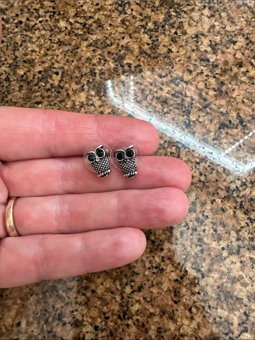 Owl fashion earrings with black crystal eyes. Silvertone. Very small.